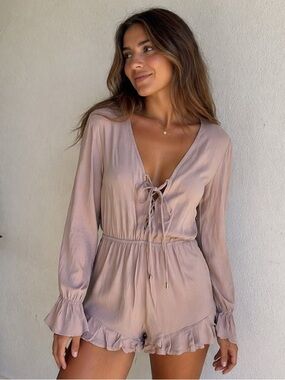 Aakaa Lace-Up Long Sleeve Romper in Blush